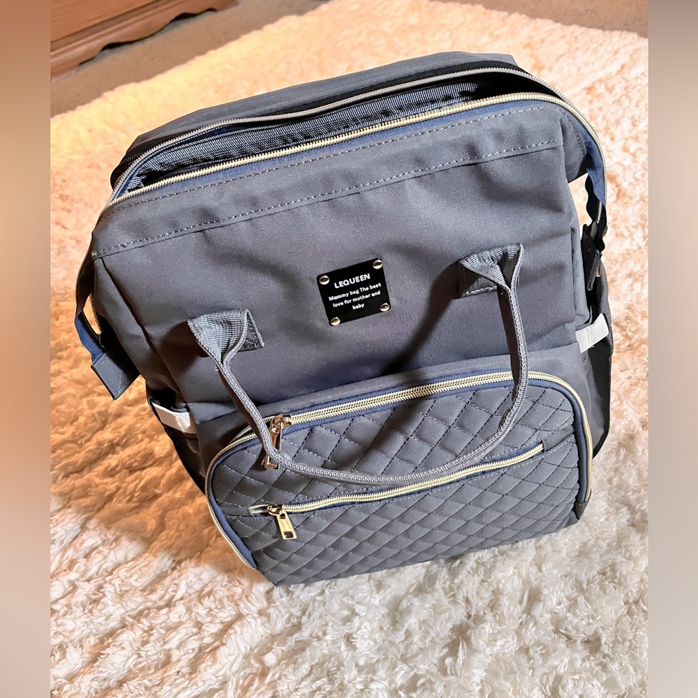 Lequeen diaper bag backpack/changing station